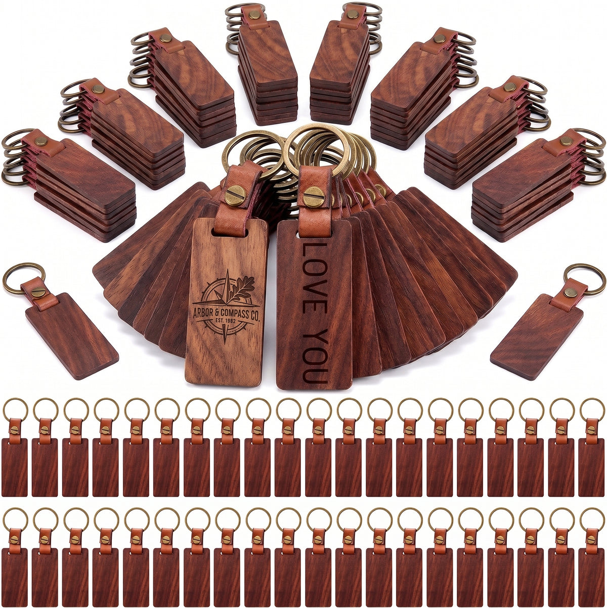 A bulk set of wooden keychains with brass key rings and brown leather loops, shown on a white background. The center features several fanned keychains, including one engraved with 'ARROWHEADS CO' and another with 'LOVE YOU' text.